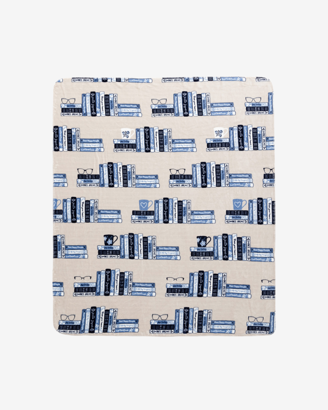 A rectangular fabric blanket, featuring a repeating pattern of blue and navy bookshelves with books on a warm beige background.