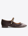 The Draper James Abigail Velvet Flat is a dark brown Mary Jane with a low heel and a pearl-studded strap, shown in side profile against a plain background.