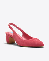 The Calla Slingback in Pink by Draper James features pink suede, a pointed toe, and a low block heel, showcased on a plain light background.