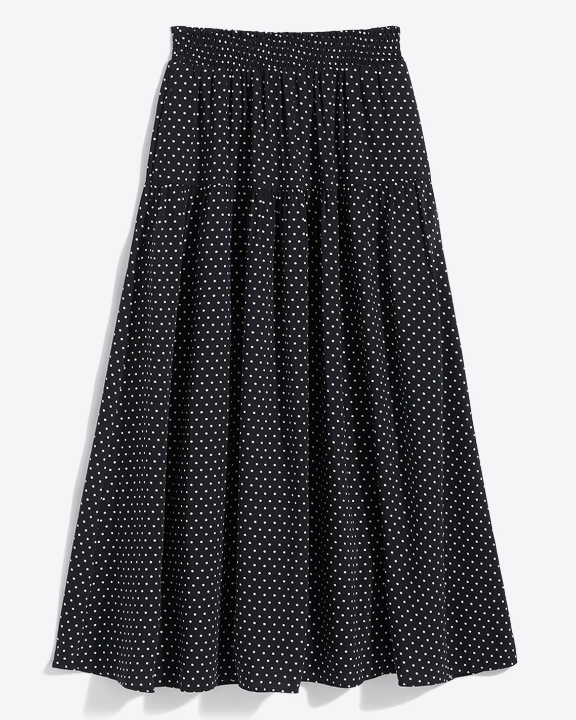 The Draper James Midi Skirt in Polka Dot features a black base with white dots, an ankle-length cut, and a comfy smocked waist for easy wear.
