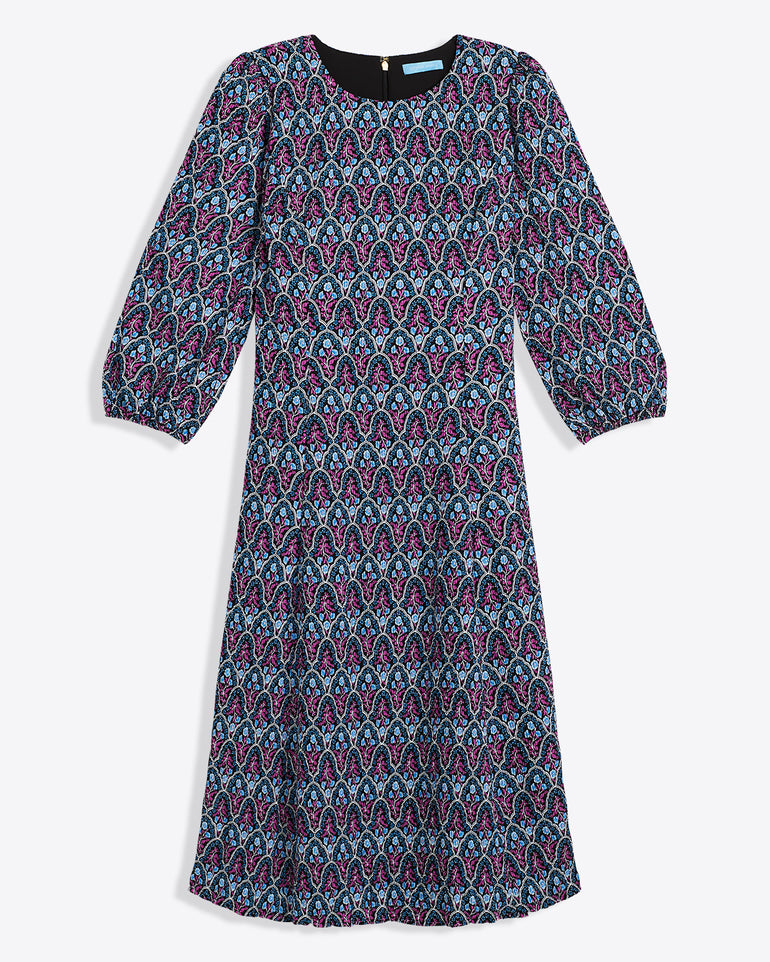 The Draper James Long-Sleeve Midi Dress features a knee-length crinkle chiffon design with multicolored paisley in blue, pink, and black, plus a crewneck and slightly puffed sleeves.