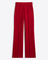 The Draper James Flare Pants in Ponte, featuring a high waist, straight-leg fit, lipstick color, front pleats, and side pockets, are shown laid flat on a white background.