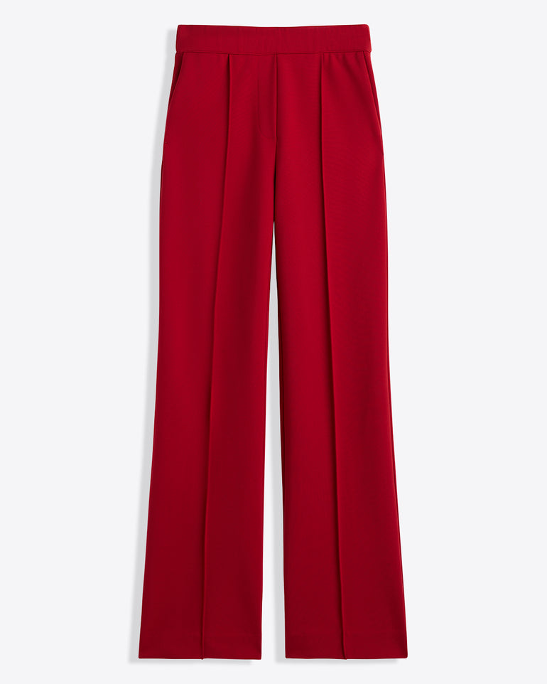 The Draper James Flare Pants in Ponte, featuring a high waist, straight-leg fit, lipstick color, front pleats, and side pockets, are shown laid flat on a white background.