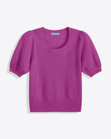 The Draper James Short Sleeve Cashmere Sweater in bright magenta pink features a scoop neckline, puffed sleeves, and ribbed hem, shown laid flat on a white background.