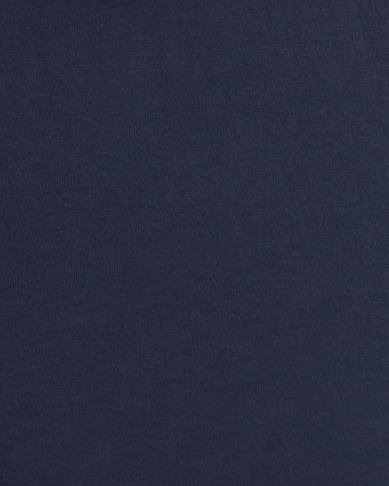 Close-up view of navy fabric texture, highlighting the luxurious feel of 100% Pima Cotton in Draper James’ Short Sleeve Easy Knit Top.