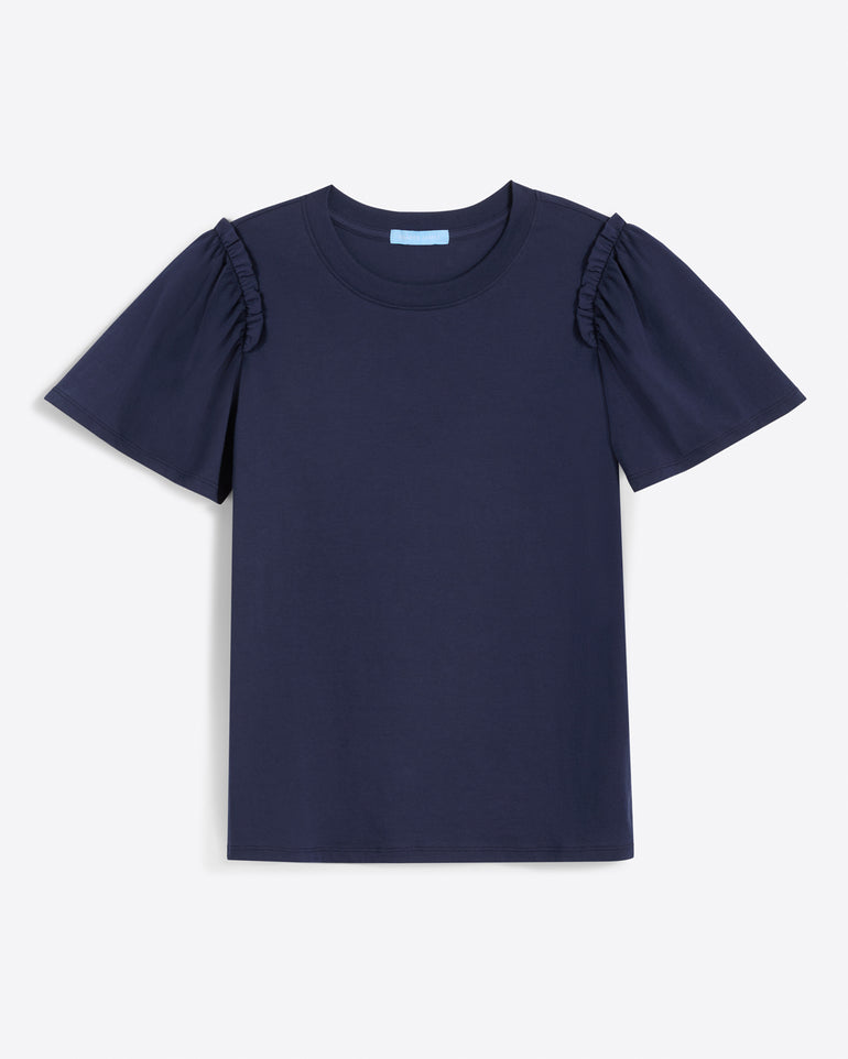 The Draper James Short Sleeve Easy Knit Top in Navy is made from 100% Pima Cotton and features slightly puffed butterfly sleeves.